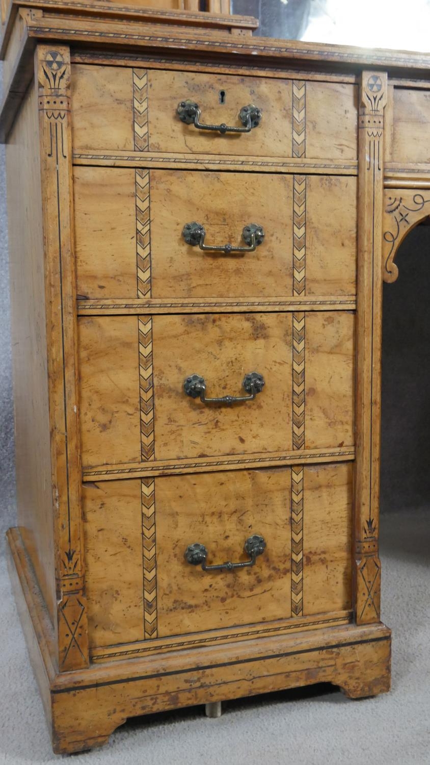 A late 19th century Aesthetic style walnut dressing table with incised carved decoration and ebony - Image 5 of 15