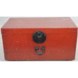 A vintage Chinese lacquered trunk with metal clasp and twin carrying handles. H.38 W.72 D.40cm