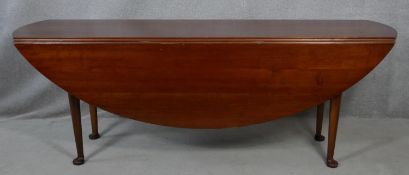 A Georgian style mahogany wake table on slender cabriole pad foot supports. H.76 L.213.5 W.153cm