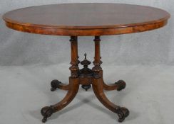 A Victorian burr walnut quarter veneered and satinwood inlaid occasional table on quatreform