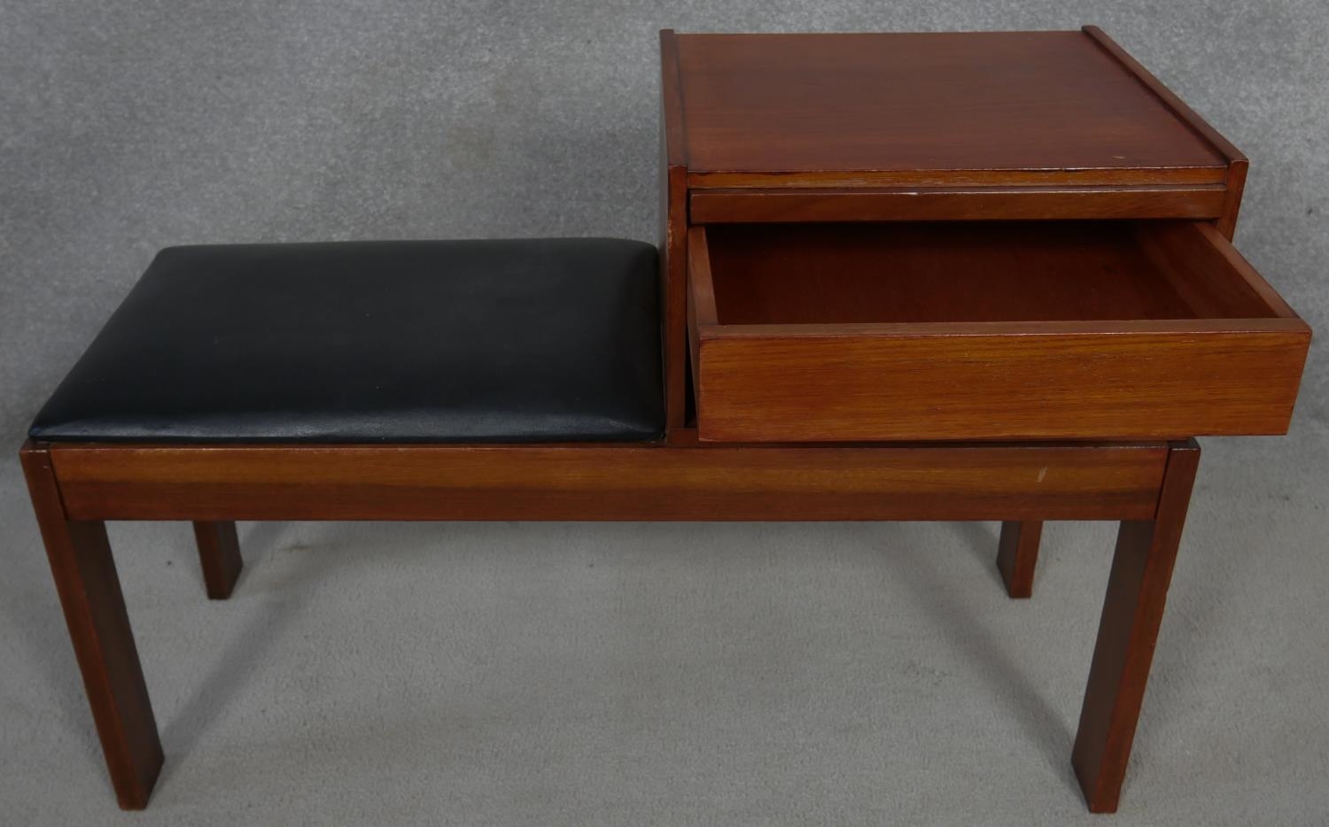 A 1970's vintage teak telephone table with pull out laminated directory board marked; Original - Image 2 of 7
