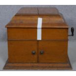 A C.1900 oak cased wind up gramophone. H.35 L.50 W.43.5cm