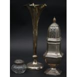 A collection of silver items. Including a weighted floral design trumpet vase, hallmarked: GDR for