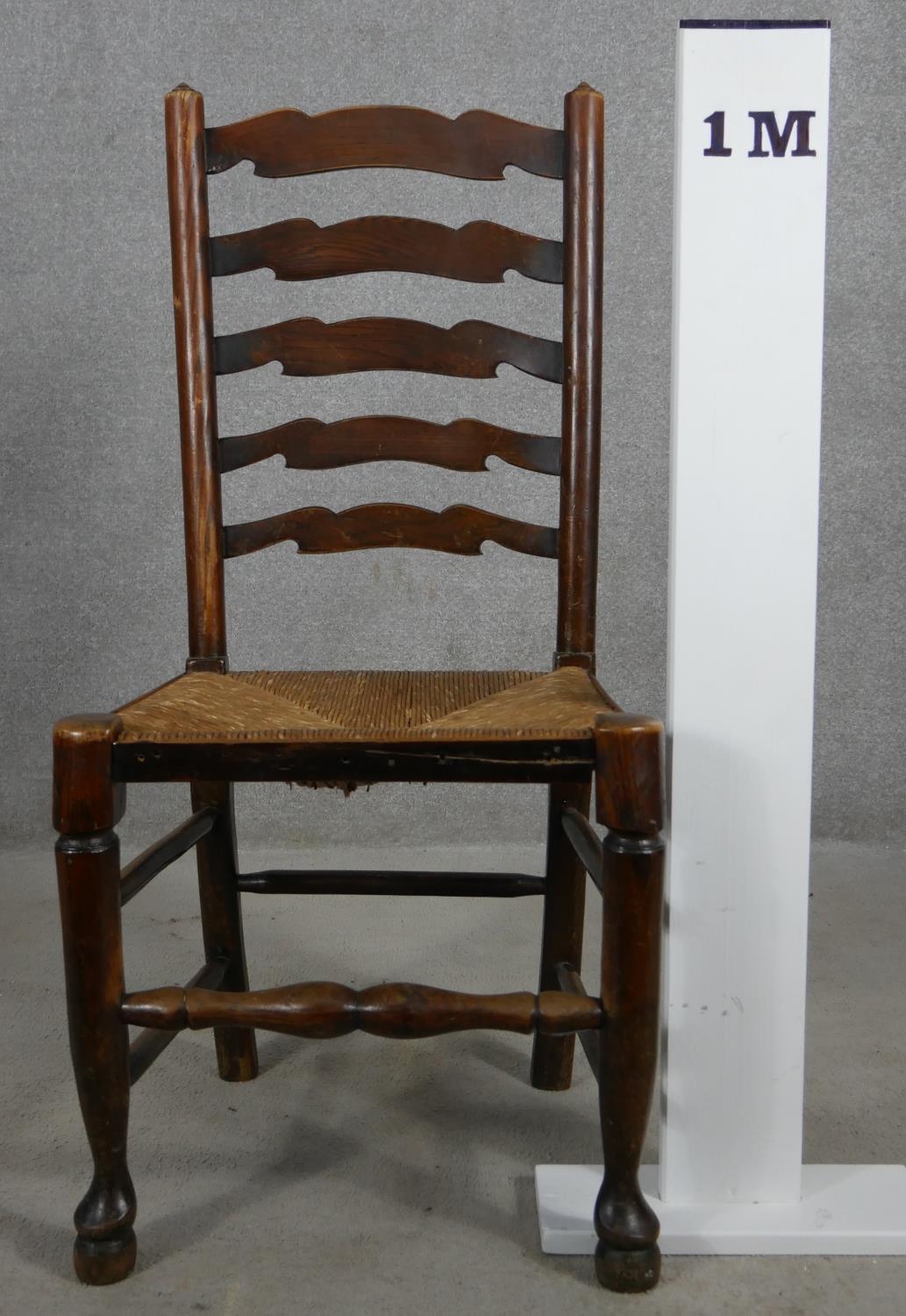 A set of six oak Lancashire ladderback dining chairs with woven rush seats on turned stretchered - Image 7 of 7