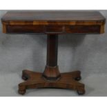 A Regency rosewood foldover top card table on facetted column and quatreform base. H.71 L.91 W.92cm