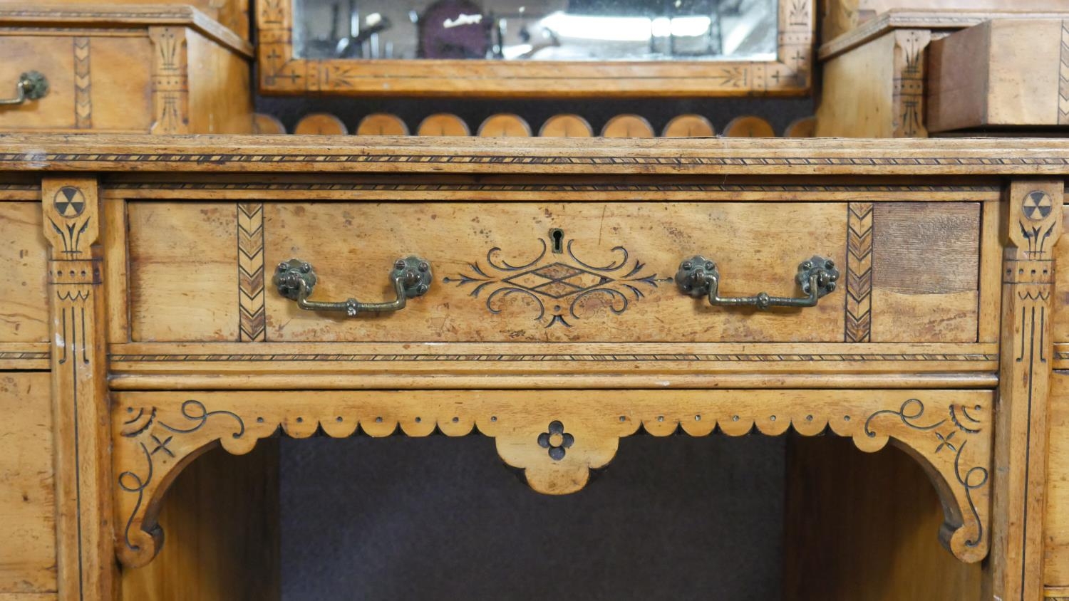 A late 19th century Aesthetic style walnut dressing table with incised carved decoration and ebony - Image 4 of 15