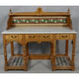 A late 19th century Aesthetic style walnut marble topped washstand with tiled upstand and platform