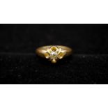 A Victorian 18 carat yellow gold and old mine diamond gypsy ring. Set with a cushion shape old