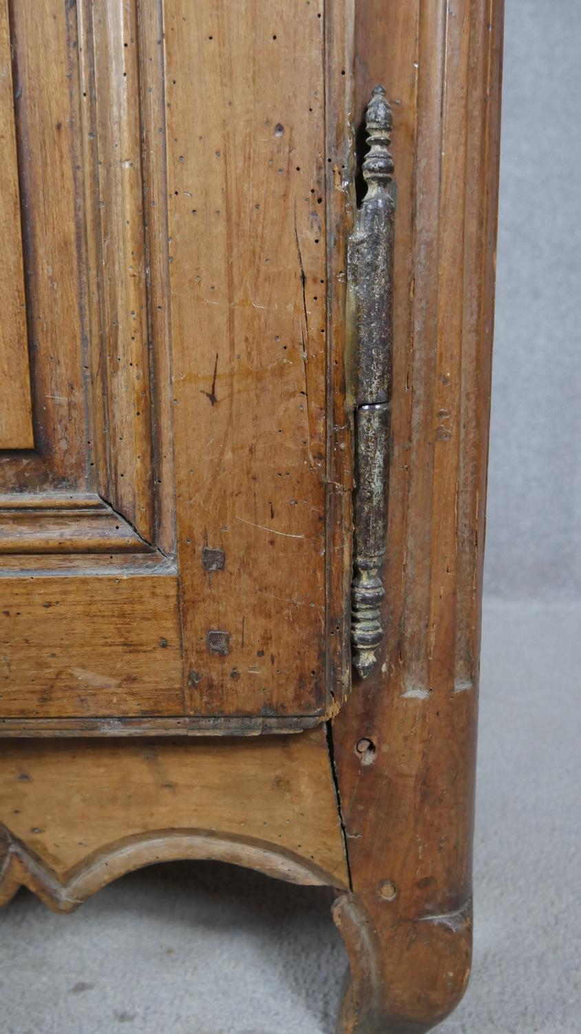 A 19th century carved chestnut French armoire. H.218 W.129 D.59cm (extensive woodworm damage and - Image 10 of 40