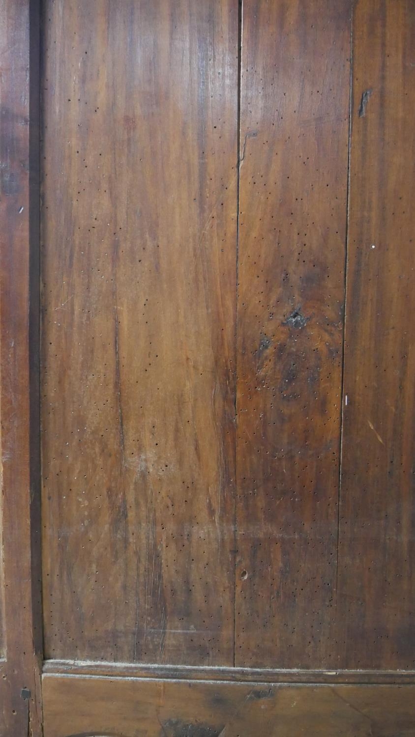 A 19th century carved chestnut French armoire. H.218 W.129 D.59cm (extensive woodworm damage and - Image 12 of 40