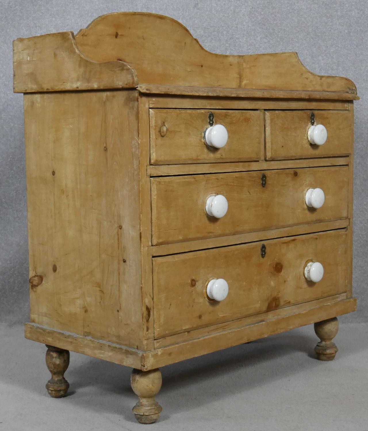 A Victorian pine chest with galleried back and porcelain handles on turned supports. H.97 W.85.5 D. - Image 2 of 6