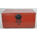 A vintage Chinese lacquered trunk with metal clasp and twin carrying handles. H.38 W.72 D.40