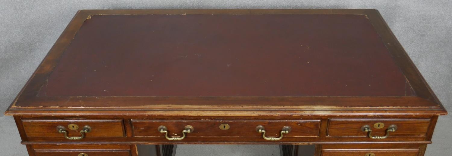 An early 20th century mahogany three section pedestal desk with maker's plaque to the inside and - Image 7 of 8