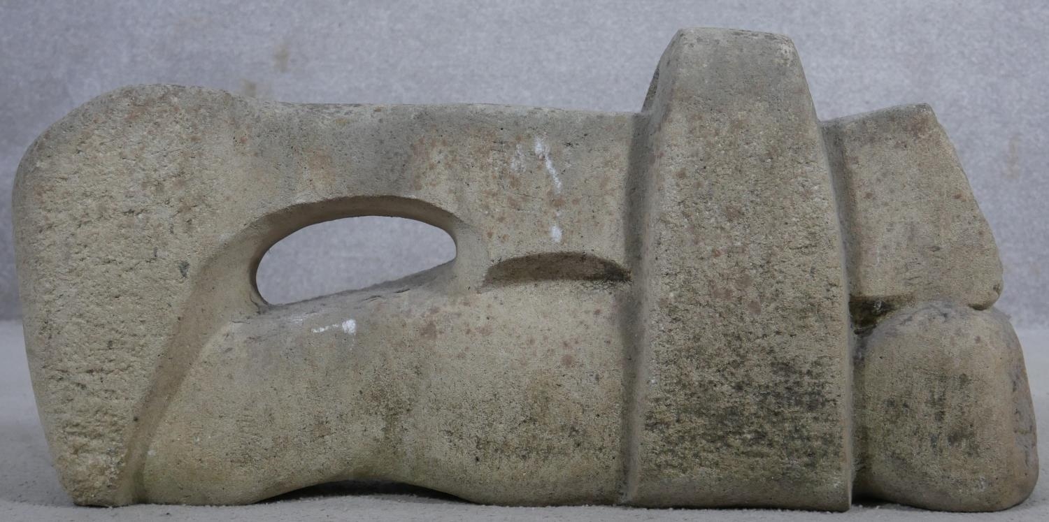 A craved hardstone sculpture of abstract form. H.32 W.70 D.15cm