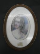 A framed antique miniature painting on ivory of a young woman with blonde ringlets in her hair. H.13