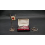 A silver and silver plate bridge set. Including a cased set of silver and enamel bridge marker/