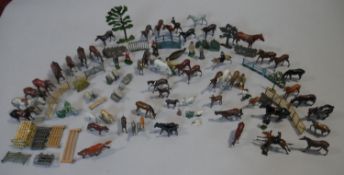 An extensive collection of vintage painted lead farmyard and sporting animals and people, around 100
