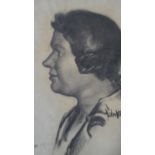 A framed and glazed charcoal drawing, profile portrait, signed John Vickery. H.42.5 W.33cm