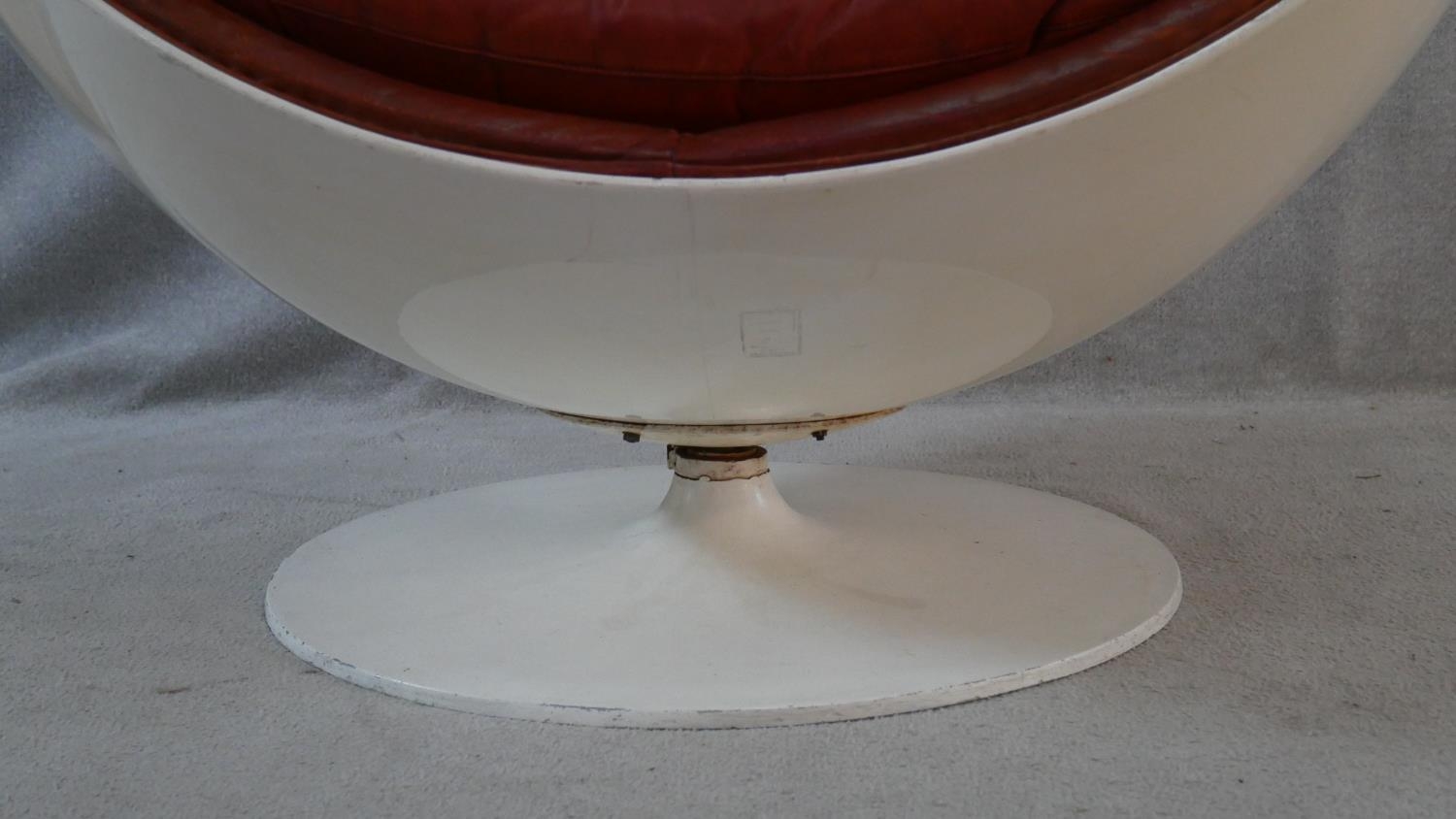 After Eero Aarnio, a vintage white polyester Ball Chair on swivel metal base with burgundy leather - Image 2 of 5