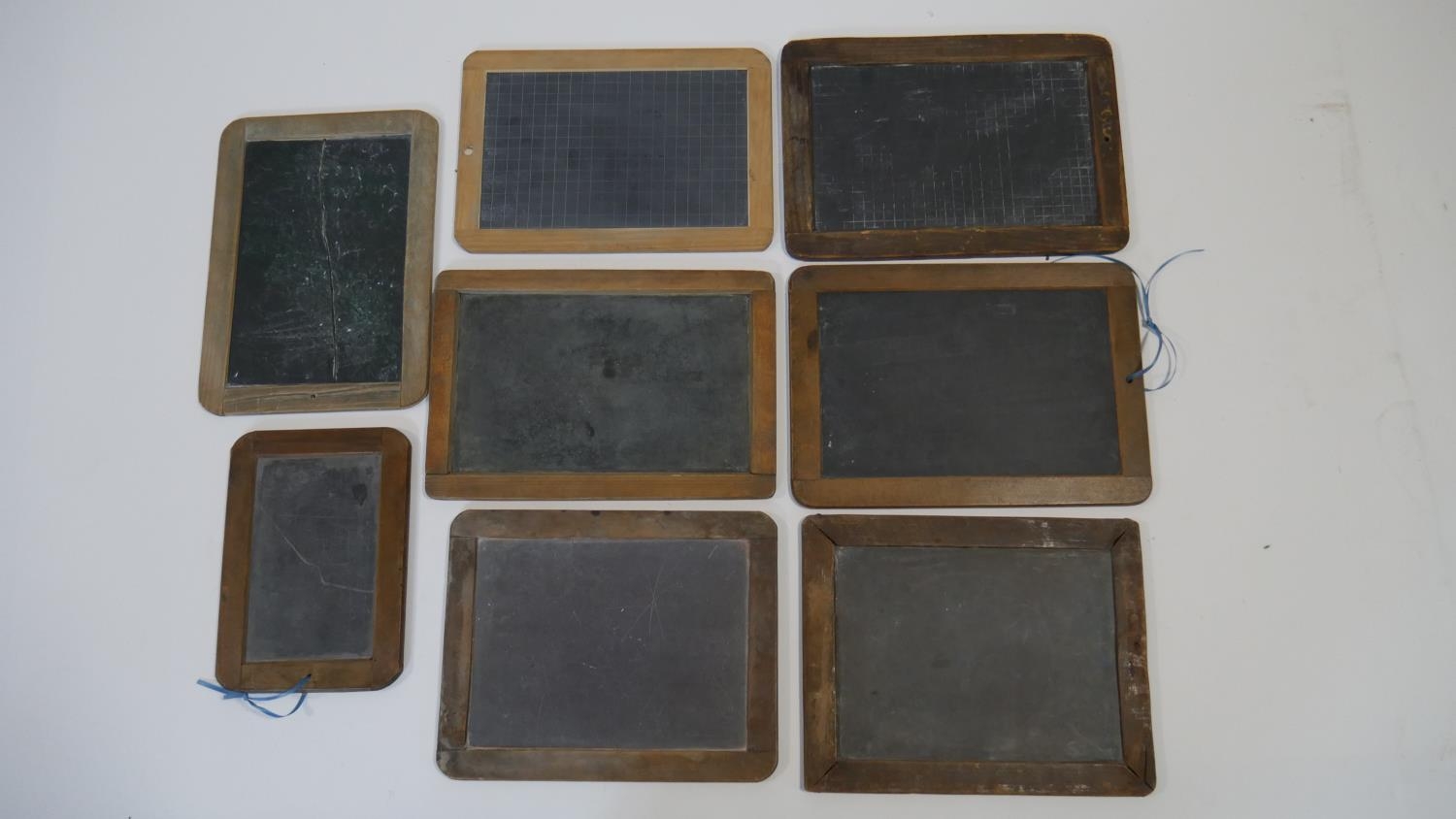 A collection of eight vintage wooden framed chalkboards, some slate. H.28 W.20cm (Largest)