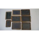 A collection of eight vintage wooden framed chalkboards, some slate. H.28 W.20cm (Largest)