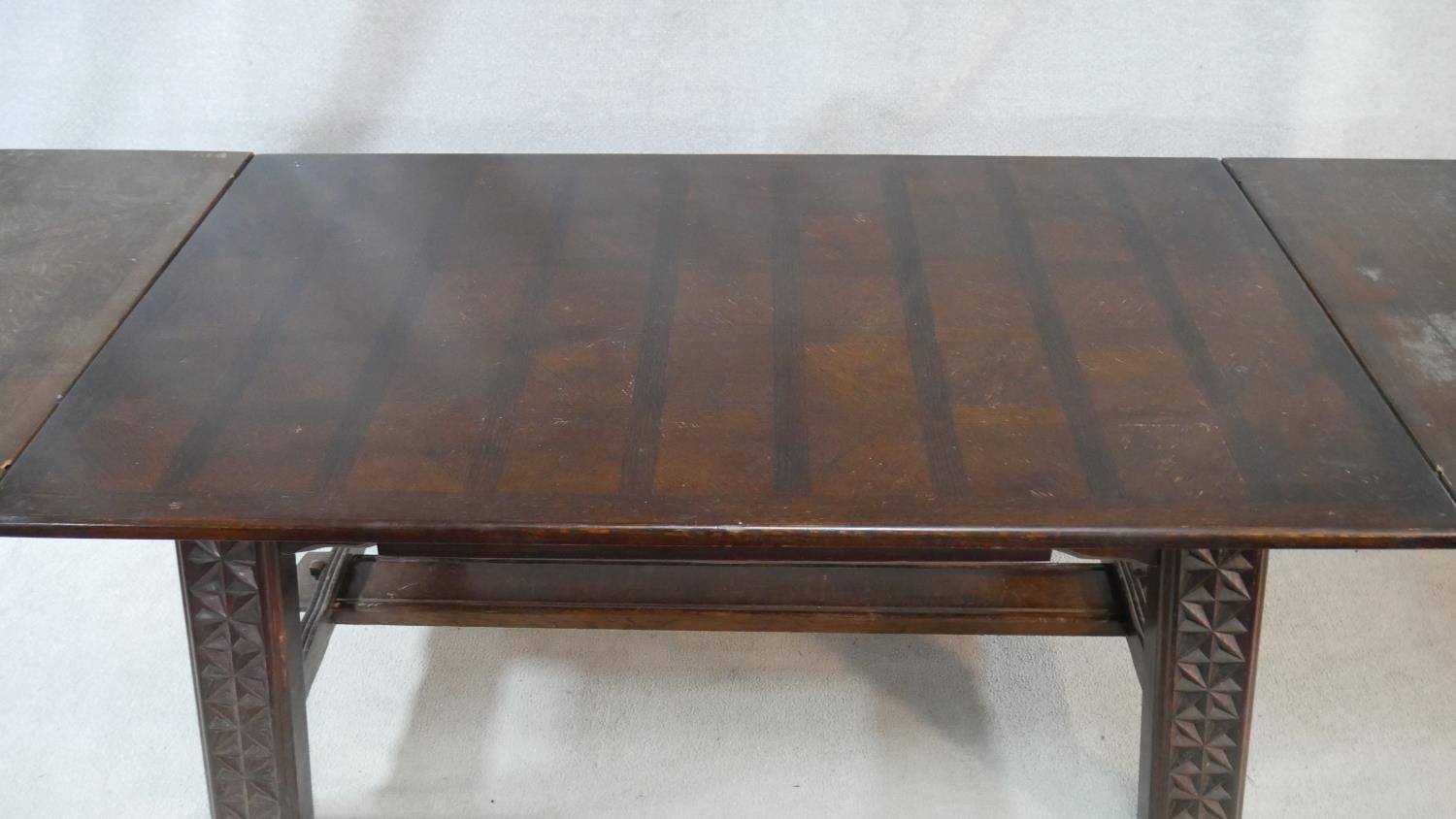 A vintage oak draw leaf dining table on carved square stretchered and pegged supports. H.76 L.267 - Image 6 of 6