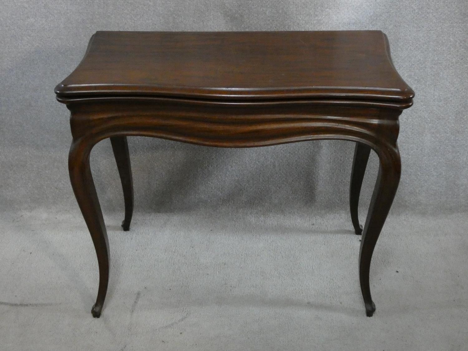 An antique mahogany Louis XV style fold over top card table with tooled leather inset top and pull - Image 2 of 8