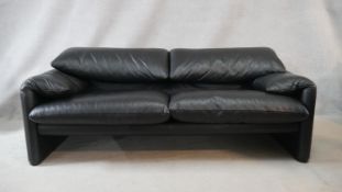 A vintage Maralunga sofa in black leather upholstery with adjustable back rests by Vico