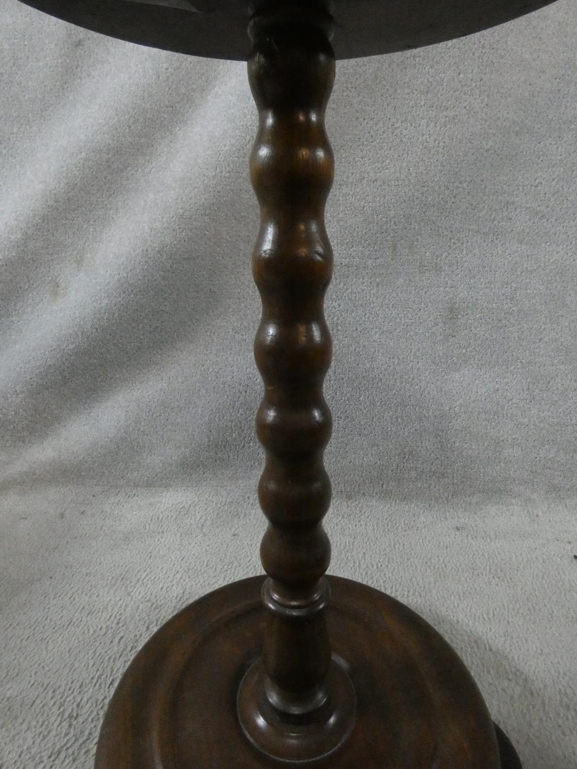 A Victorian mahogany lamp table on bobbin turned column on platform base. H.65 L.43 W.43cm - Image 5 of 6