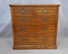 A Victorian walnut chest of drawers with original brass handles on plinth base. H.107 W.107 D.53cm