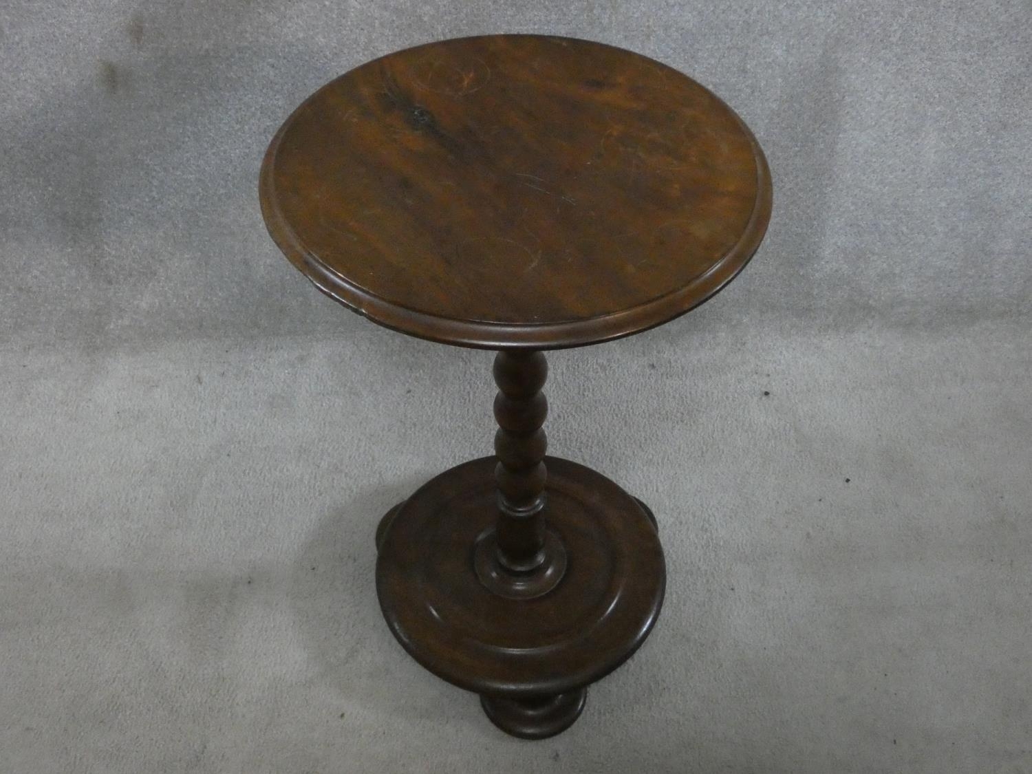A Victorian mahogany lamp table on bobbin turned column on platform base. H.65 L.43 W.43cm - Image 2 of 6