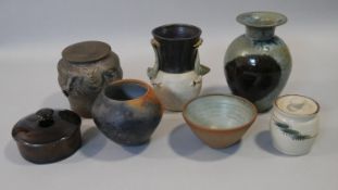 A collection of seven Studio pottery pieces. Some with makers marks and signatures. H.22cm (Tallest)