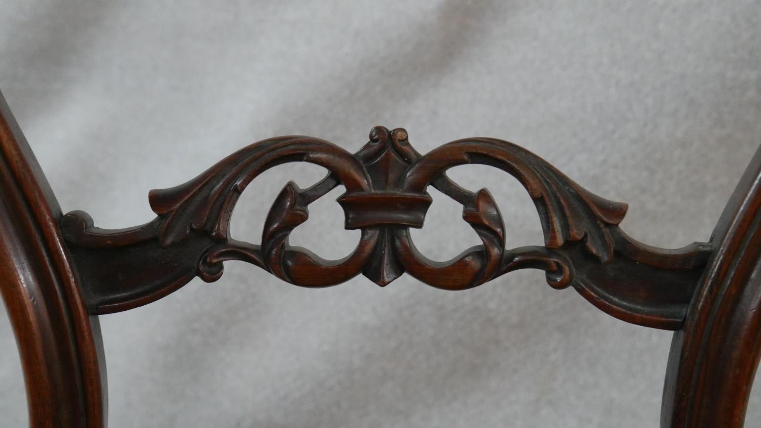 A pair of Victorian carved mahogany balloon back dining chairs on cabriole supports. H.88cm (damaged - Image 6 of 10