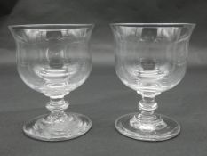 A pair of antique blown glass stemmed rummers with rounded foot. H.12cm