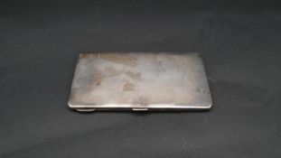 An engine engraved silver cigarette case hallmarked WN Ltd for William Neale, Birmingham, 1935. H.