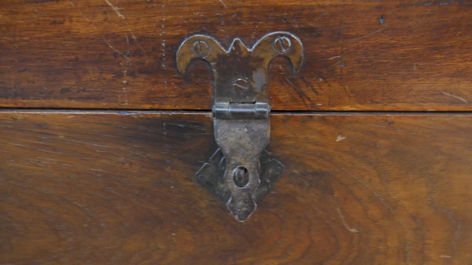 A 19th century camphor hinged lidded travelling trunk with twin iron carrying handles. H.40 W.77 D. - Image 2 of 7