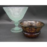 An antique Bohemian amber flashed ruby uranium cut glass bowl with engraved floral and foliate