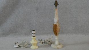 A vintage onyx lamp base along with a similar example. H.48cm (Tallest)