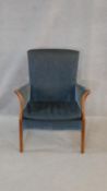 A mid century Parker Knoll armchair in original upholstery. H.82cm