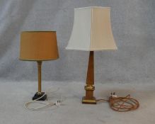 A vintage brass Corinthian column table lamp on a marble base and a similar in the form of an