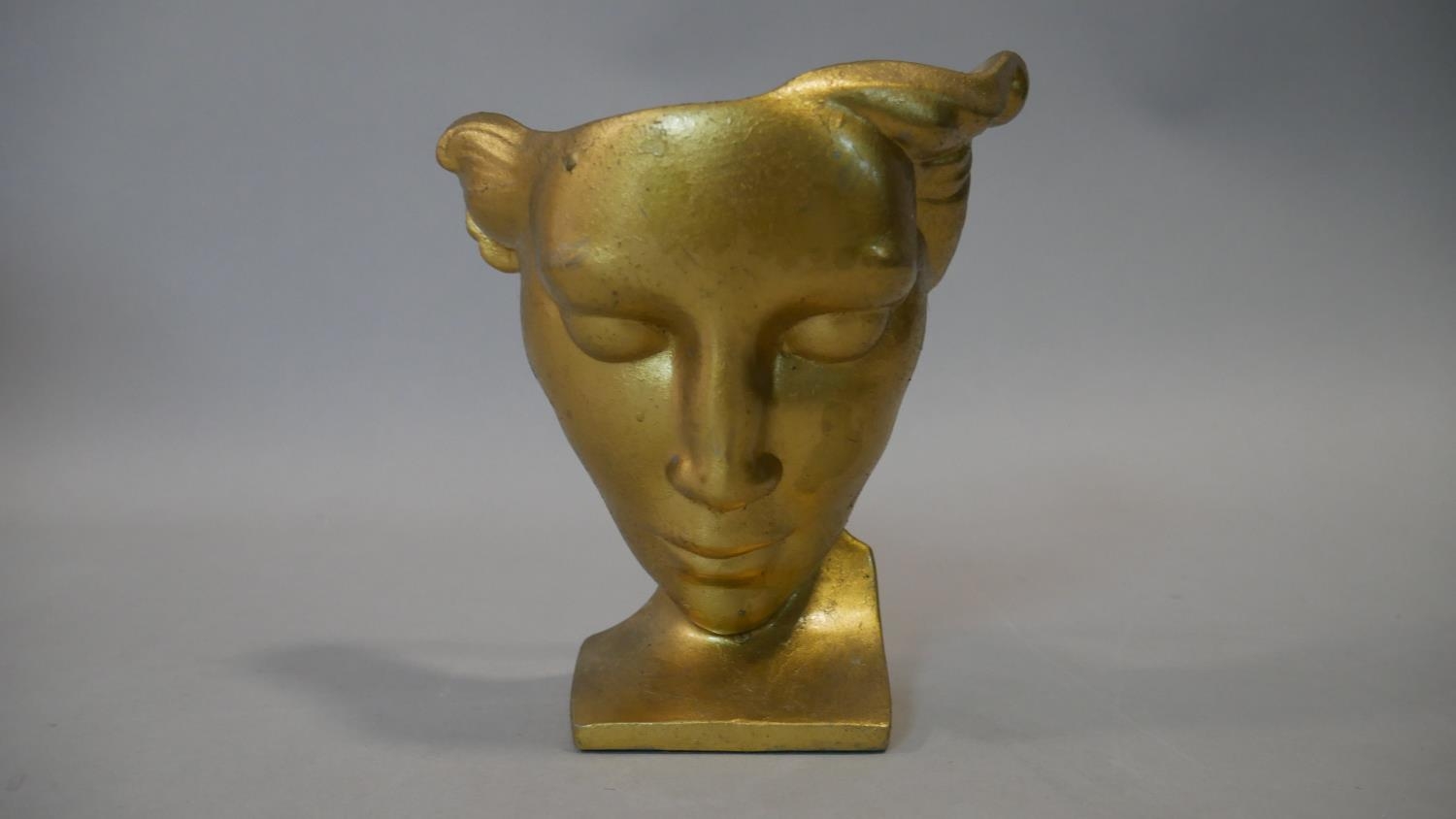 A gilt metal mask on stand with impressed marks to the back, a medieval style carving and a - Image 4 of 8