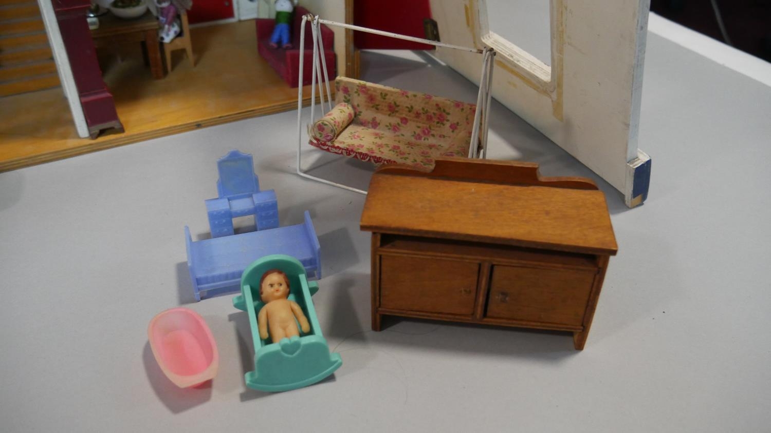 A vintage scratch built doll's house complete with furniture and effects. H.60 L.60 W.24cm - Image 3 of 7