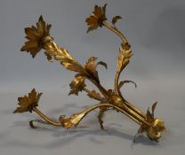 A gilt metal five branch candelabra with naturalistic flower and leaf arms L.48cm