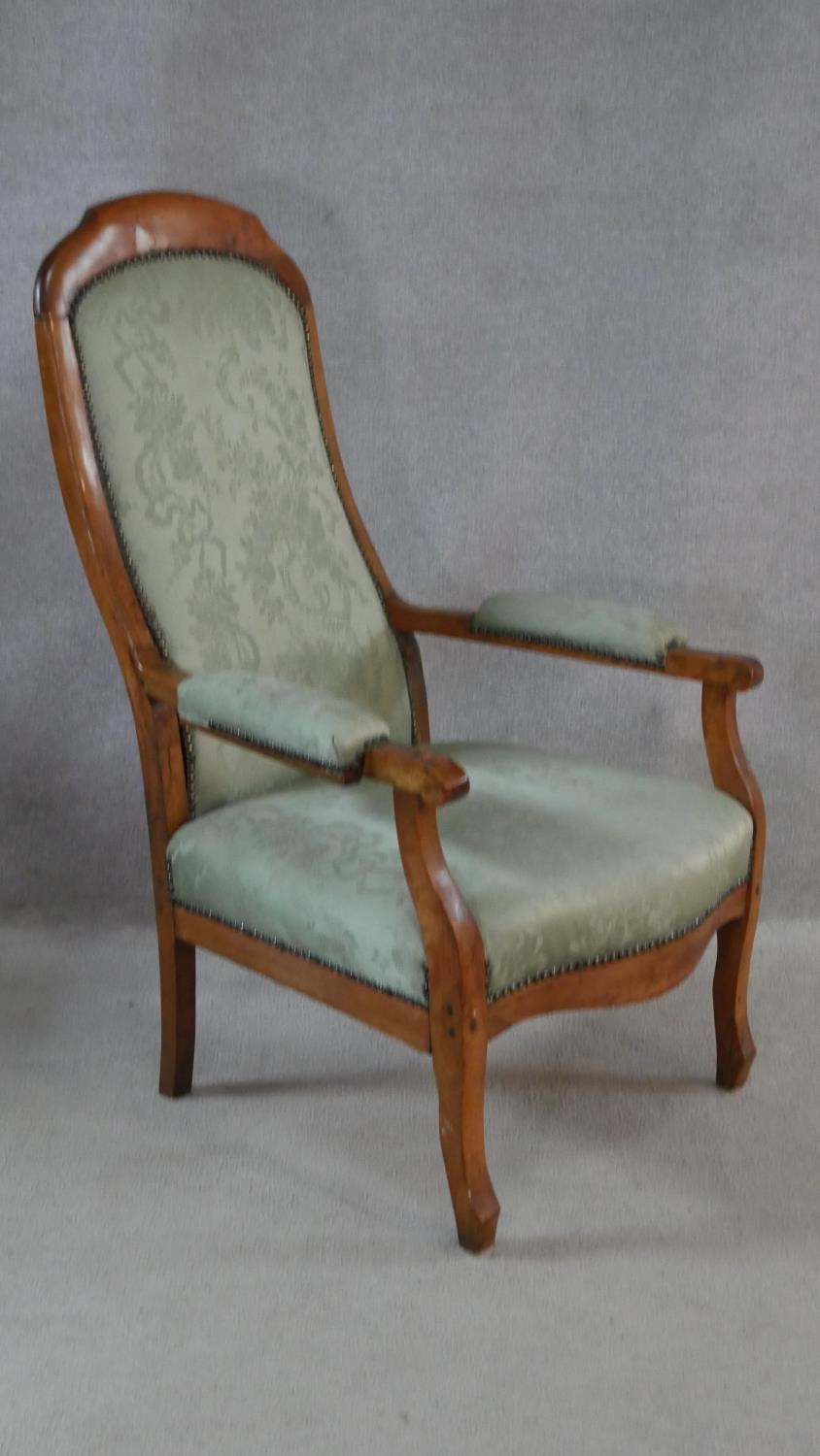 A 19th century French provincial fruitwood armchair in floral damask upholstery. H.109cm - Image 4 of 5