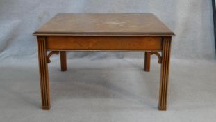 A Georgian style burr elm coffee table. H.47 W.76.5 L.76.5cm