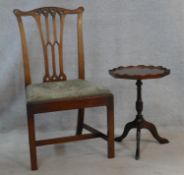 A Georgian mahogany Gothic carved dining chair and a small Georgian style mahogany occasional table.