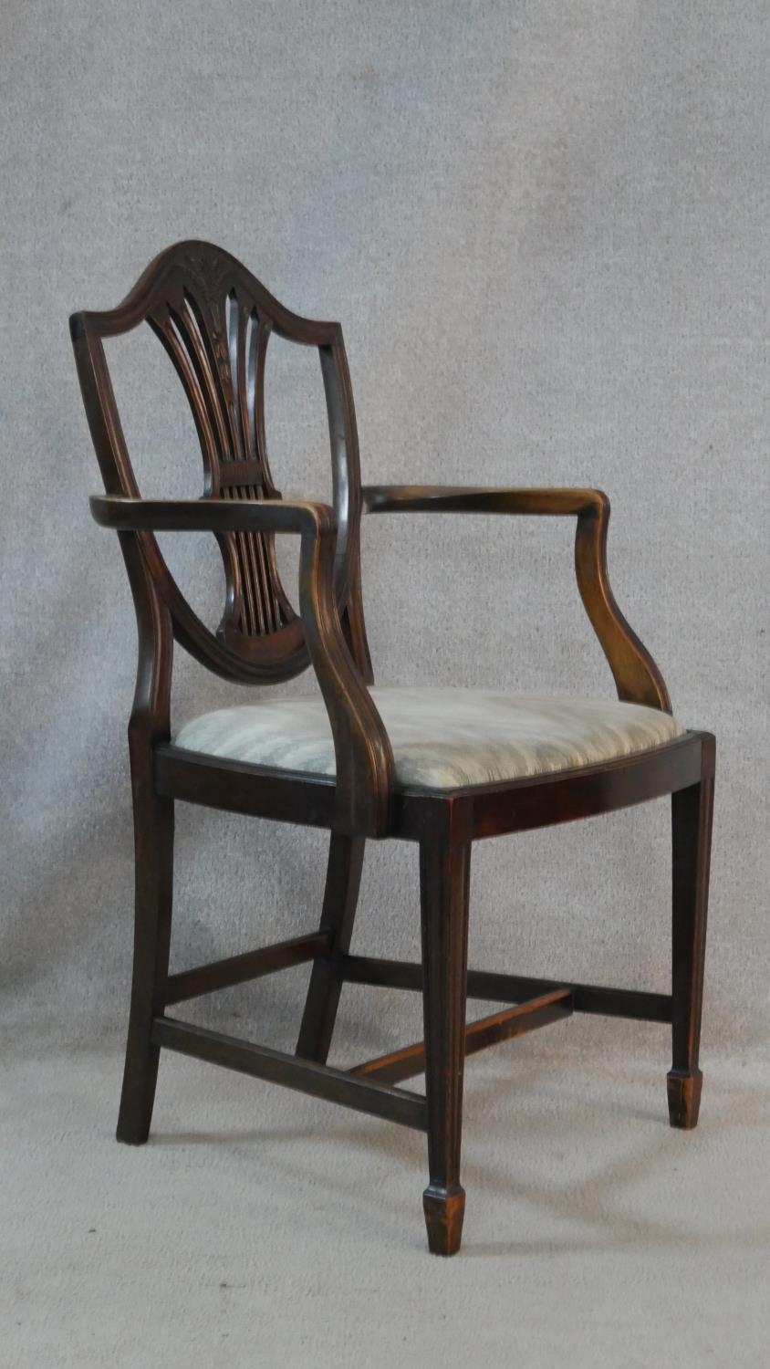 A set of eight Hepplewhite style mahogany shield back dining chairs with drop in seats on square - Image 9 of 9
