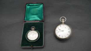 An American Elgin and Co silver plated bubble watch. With white enamel dial and engraved