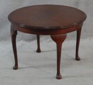 A mid century mahogany Georgian style occasional table on cabriole supports. H.43 D.61cm