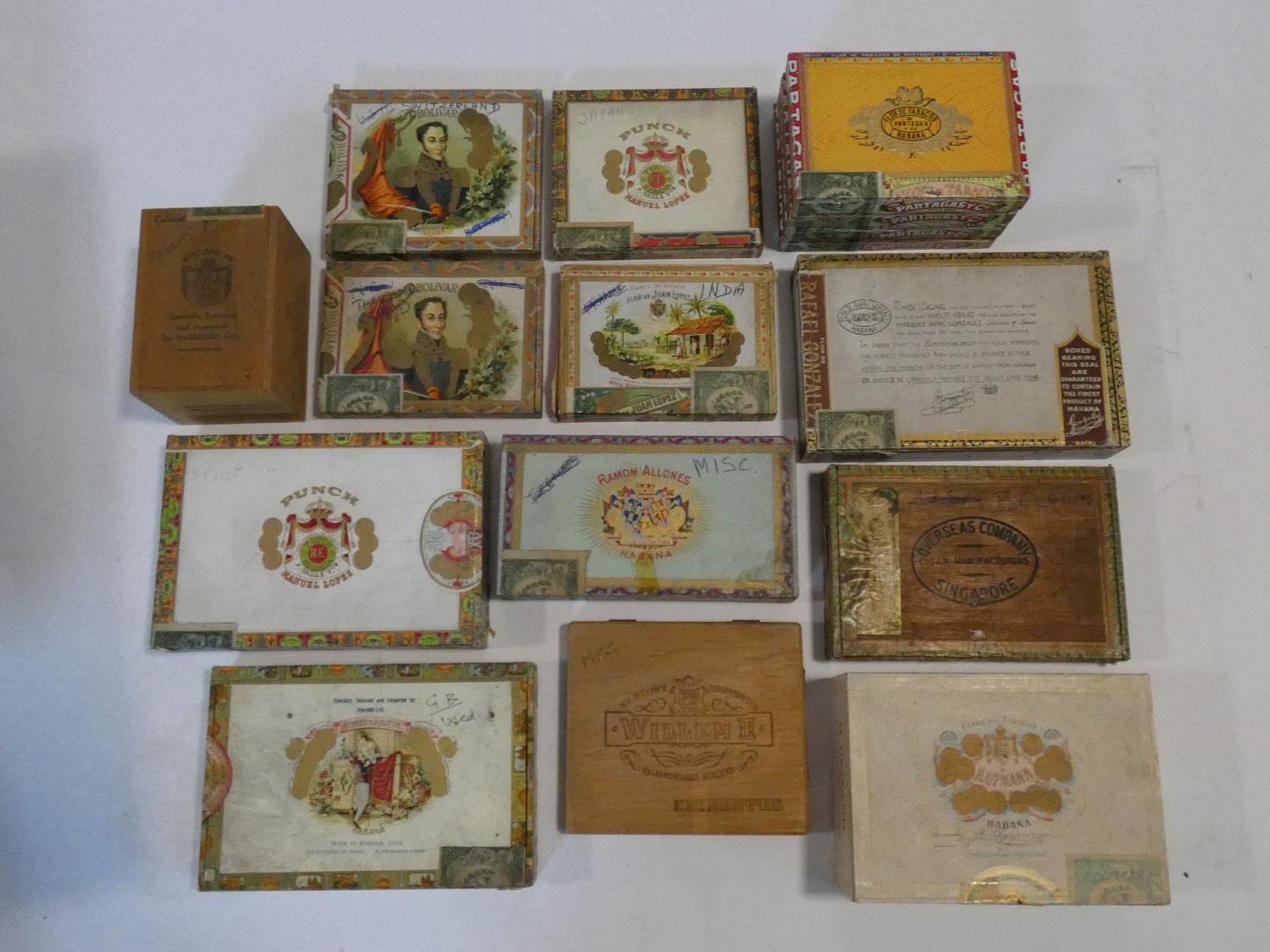 A miscellaneous collection of thirteen vintage Cuban cigar boxes, various brands. H.8 L.15 W.21cm